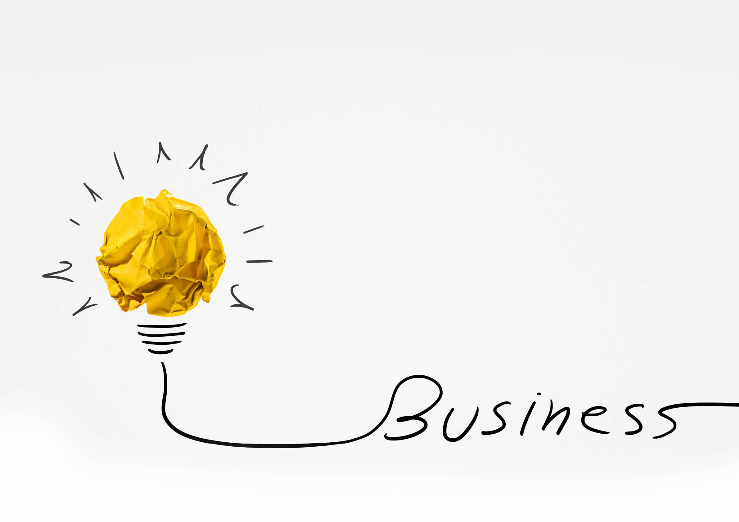 Idea with yellow paper ball ( lightbulb ) and business word.Creative concept.